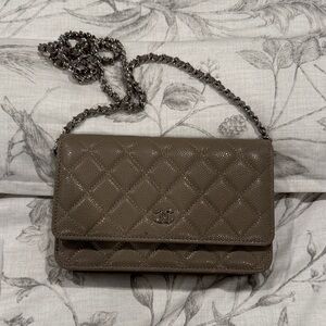 CC style taupe wallet on a chain